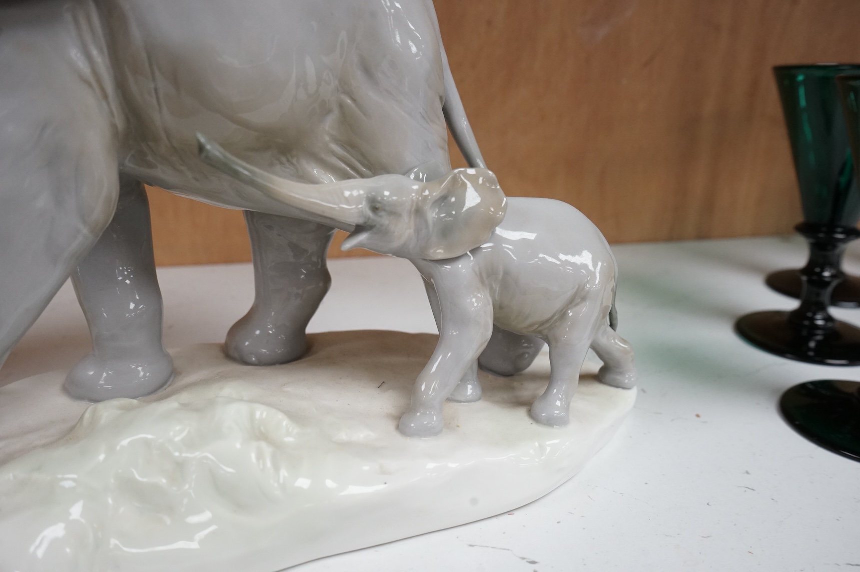 A Lladro elephant and calf figure group, 30cm high